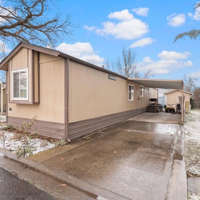 2. Street view home and carport