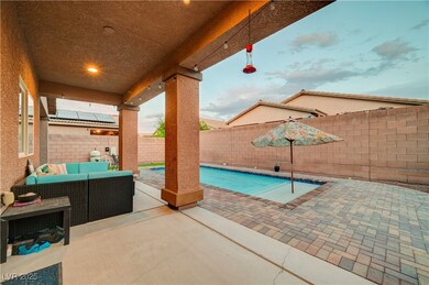 View of swimming pool with an outdoor hangout area