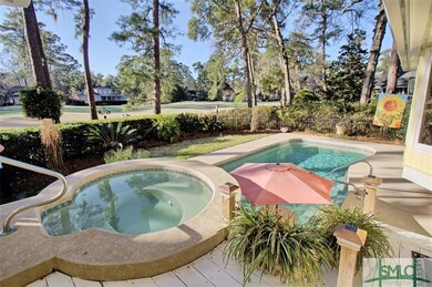 Pool and hot tub with golf views