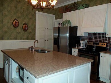 Kitchen. Kitchen with island and white cabinets