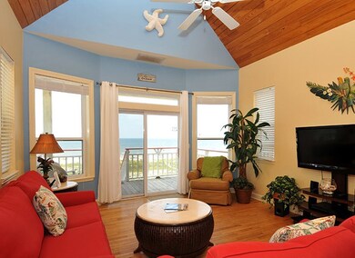 Living room with vaulted ceiling