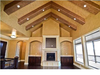 The custom fireplace with built-ins is a striking 