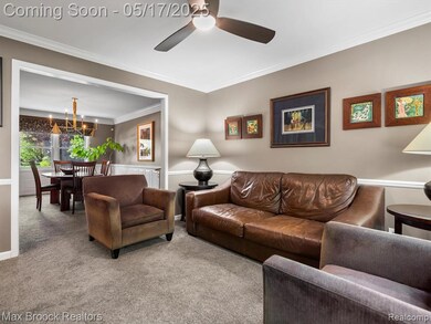 Living room with ceiling fan.