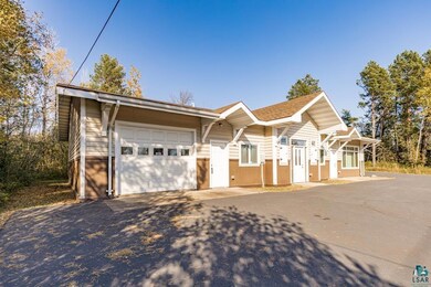 Single story home with asphalt driveway and an att