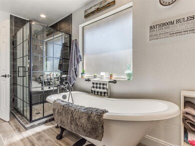 Main Bathroom with separate shower and soaking tub