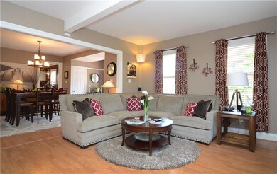 Open living and dining room.