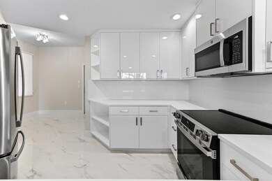 12510 Crystal Pointe Dr unit 102, Boynton Beach, FL 33437 - photo 2