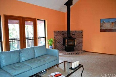 The freestanding woodstove has a nice brick hearth