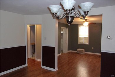 dining room view to the living room and stairs