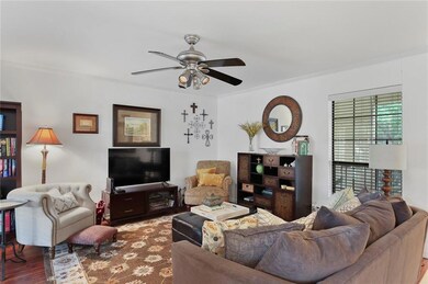 Cozy Family Room filled with natural light and lam