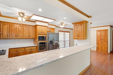Kitchen has been updated with granite countertops, all new appliances.  Dining area is adjacent.