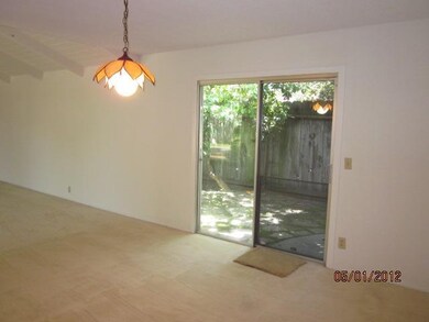 Formal dining with patio access.