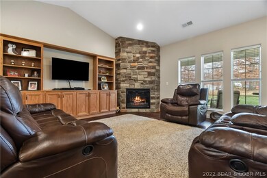 Living Room with Fireplace with built in's