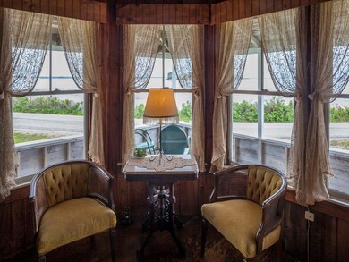 The living room has corner windows...