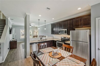 Kitchen featuring pendant lighting, sink, ornament