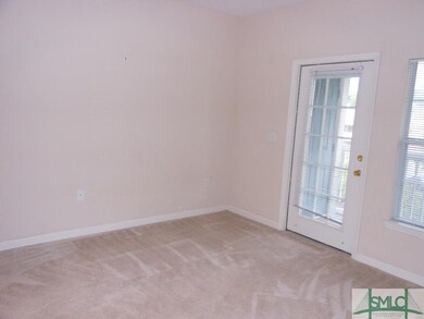 bedroom with access to screened porch