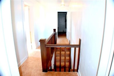 Hallway upstairs shows the spacious rooms are nice