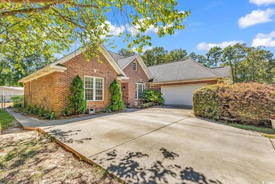 View of property with a garage