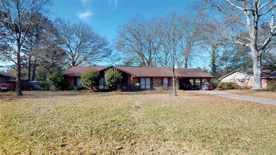 Frontview of home with large front yard