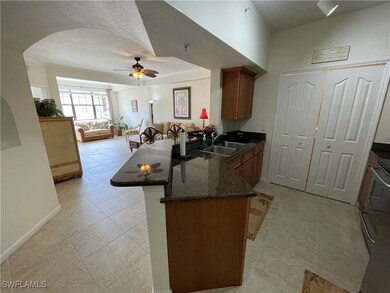 12935 Violino Ln unit 205, Naples, FL 34105 - photo 2