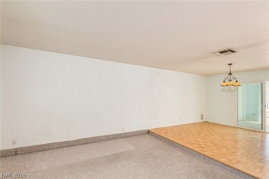 Living Room and Dining Room.  Lanai pictured in th