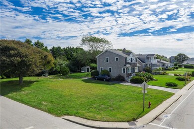 11 Weekapaug Road is a flat, grass covered corner