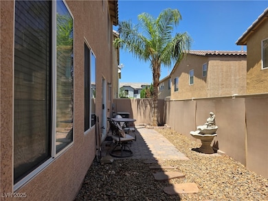 Fenced backyard with paver patio