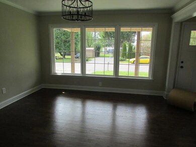 Beautiful Picture Window in Dining Room (NEW) Plus new hardwood floors & light fixture. 