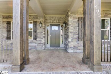 With stamped and stained concrete accent