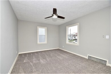 The living room in the front of the house is fresh