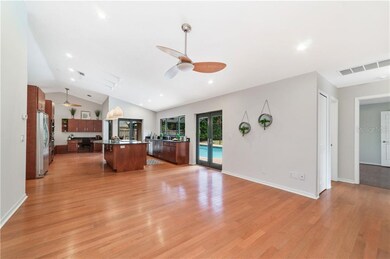 View of kitchen and pool access from Family Room