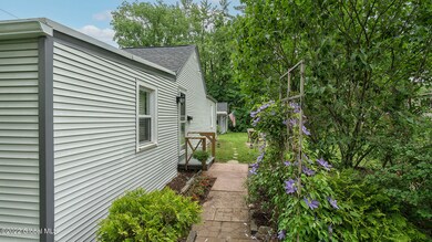 1713 Hillside Ave_side view_path way wit