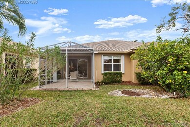 Screened lanai view from rear of home.
