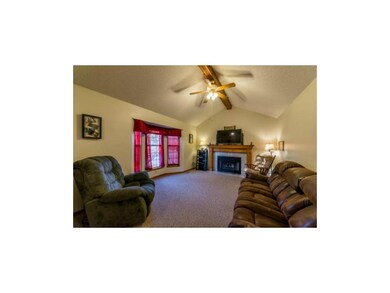 Vaulted ceiling soars over the great room