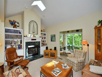 Living Roon with vaulted Ceilings and Sky Lights