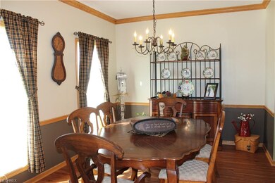 Lovely formal Dining Room includes crown molding a