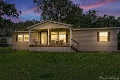 View of front of house with a lawn