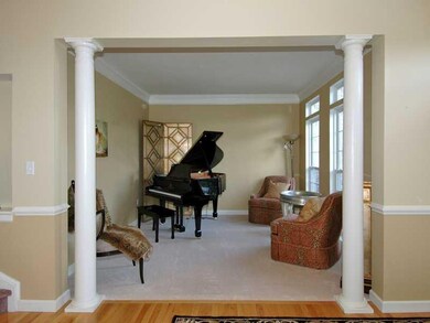 Living Room. Stately columns flank the entrance to