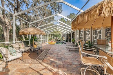 extended screened-in lanai with pavers