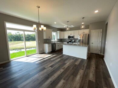 All photos of previously finished home of same floor plan -Main Level Open Floor plan with luxury vinyl plank flooring throughout the main level.