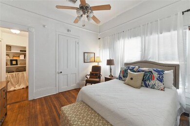 Bedroom & Small Hall w/Built In Storage Leading to