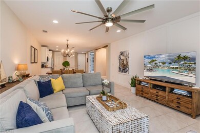 Living room featuring light tile floors throughout