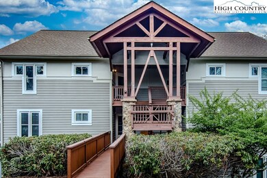 Hawks Peak West. 1 of 2 Bldgs. at this location. Level entry then upstairs to upper left condo.