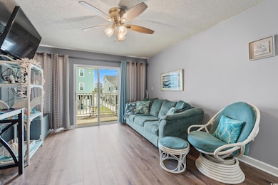 Living room leads to the balcony.