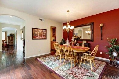 Formal Diningroom  with Distressed Hardwood Floori