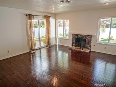 Living room.  The laminate flooring pictured here has been replaced with new laminate.