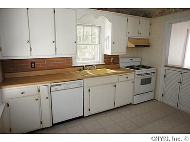 Kitchen. Bright Kitchen features soild wood cabine