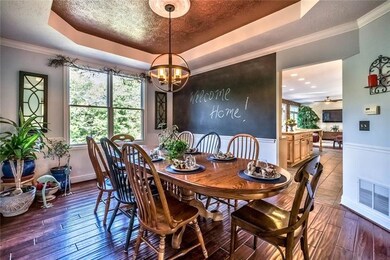 The tray ceiling and updated light fixture are a f