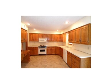 Kitchen has tons of cabinets
