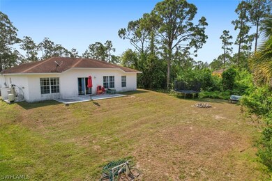 740 Oro Ave S, Lehigh Acres, FL 33974 - photo 4